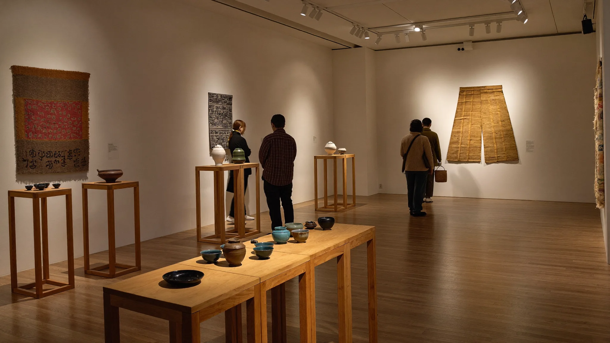 Ceramics and textiles on display in a gallery at the Japanese Canadian Cultural Centre