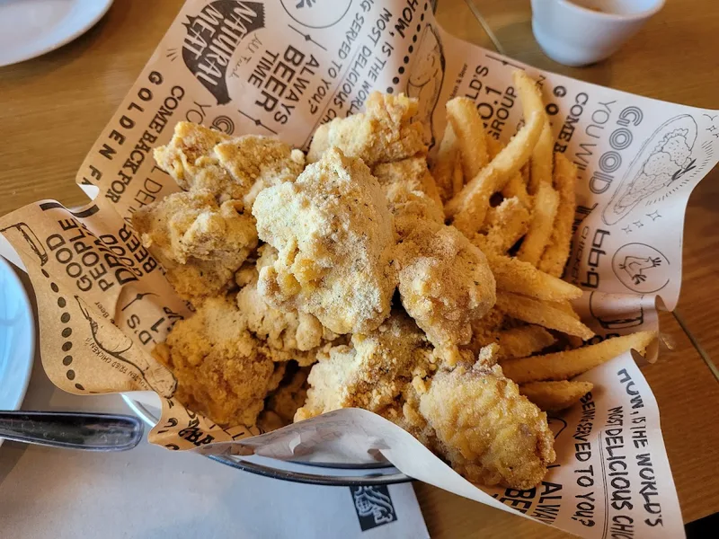 bb.q Chicken Golden Original fried chicken on bb.q-branded paper at the Cummer location