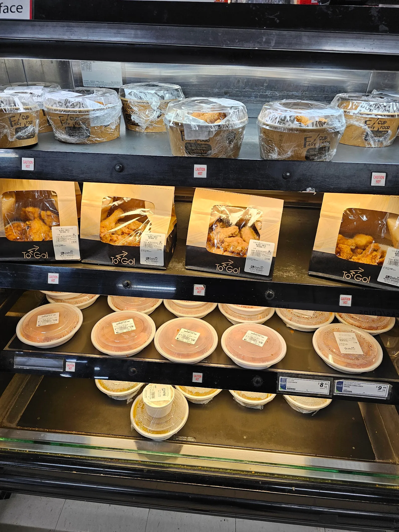 Mom's Chicken fried chicken to-go containers at Galleria Supermarket's hot food counter