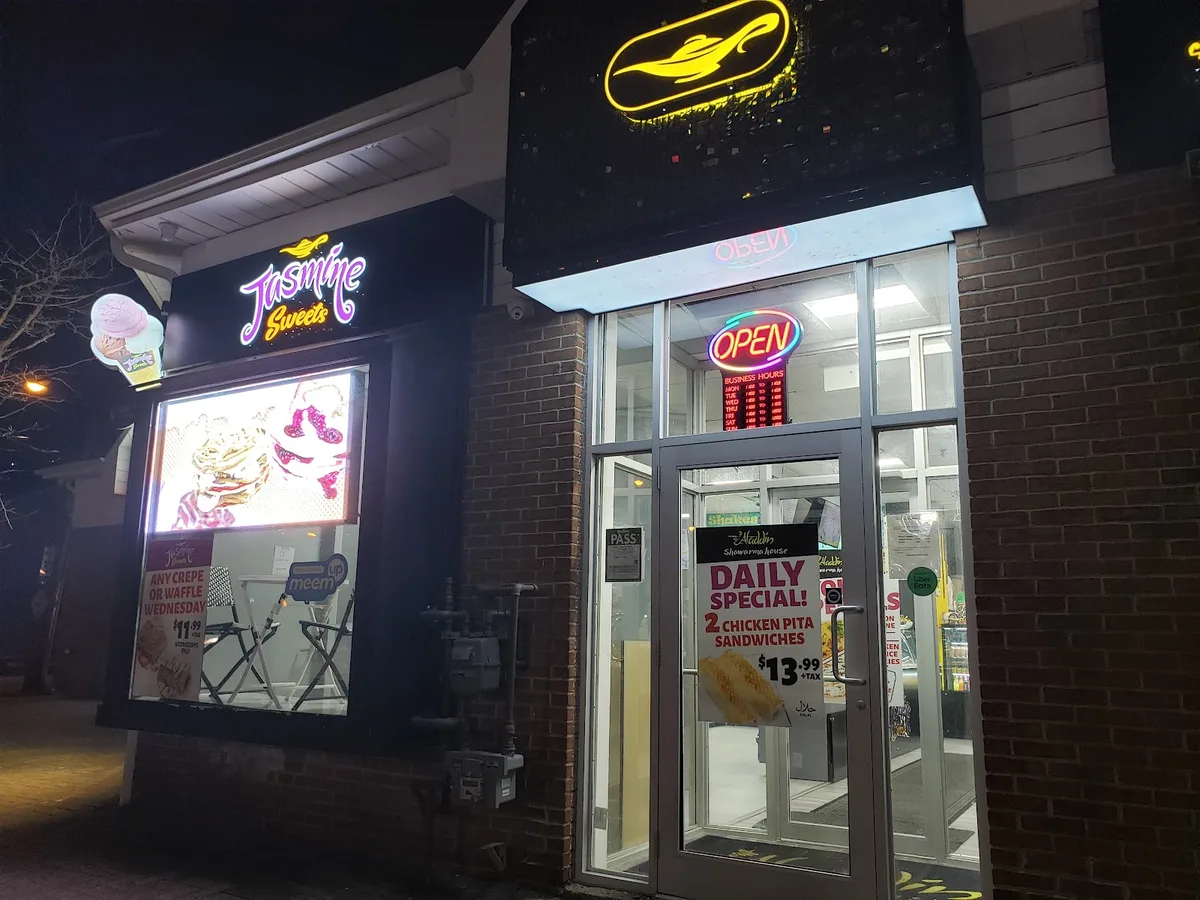 Aladdin Shawarma House Moroccan-fusion shawarma wrap and plate at 2022 Sheppard Ave E North York