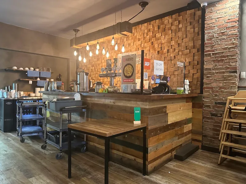 Mapo Korean BBQ interior with grilling stations and hand-painted decor