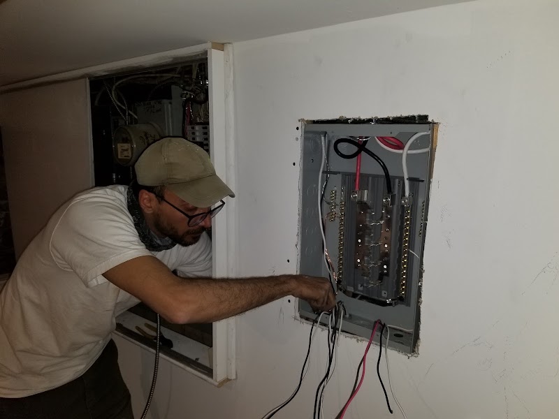 OnTime Electric electrician performing a residential panel upgrade