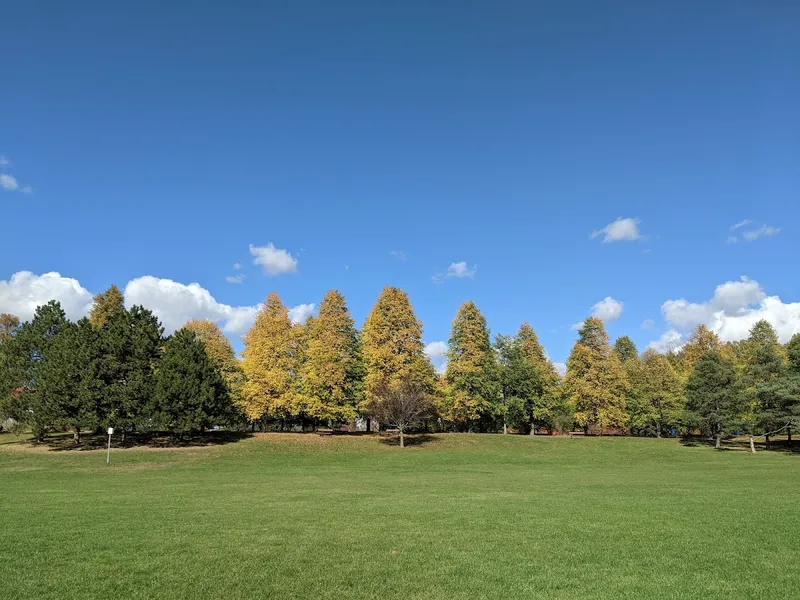 Wide paved running path at Sunnybrook Park, North York
